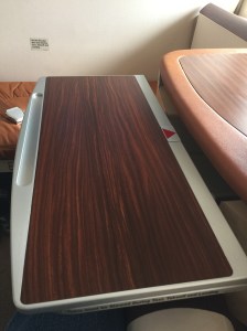 Retractable table (fix height, unlike the first class table)